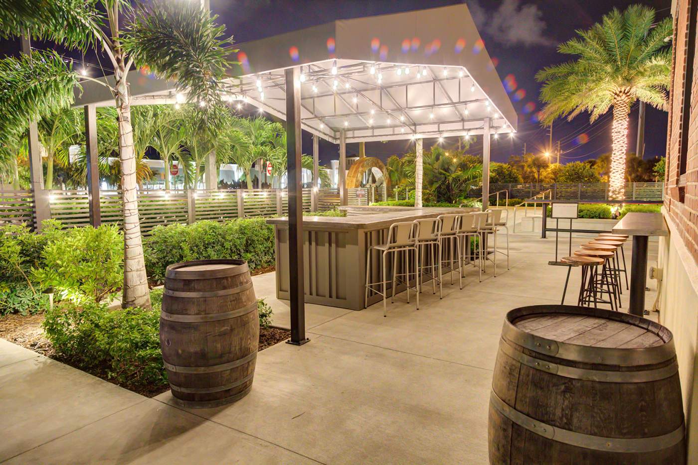 Beer garden bar area showing barrels